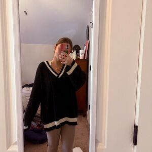 Stylish Black V-Neck Sweater with Cream Trim